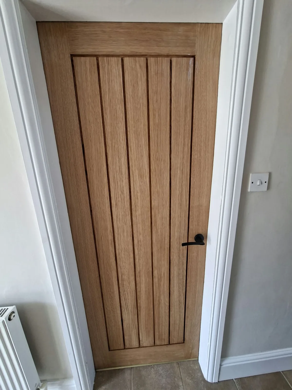 Oak cottage-style internal door installation