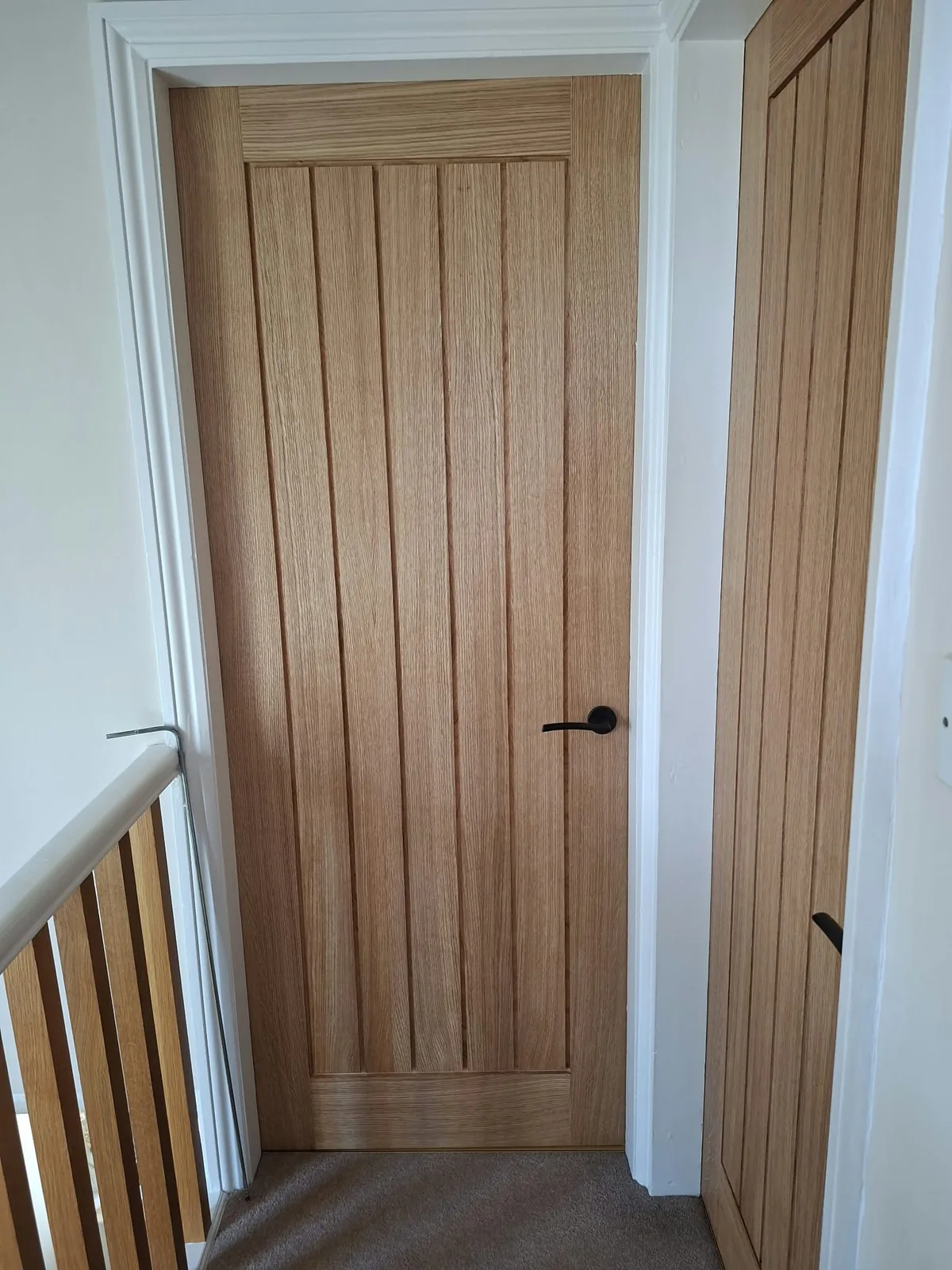 Glazed oak internal door with matching oak cottage-style door